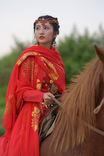 Asian woman, red dresses and horse
