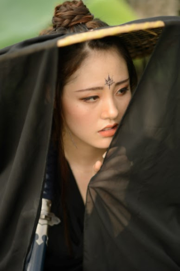 A woman dressed in ancient Chinese martial arts style - NEF format A woman dressed in ancient Chinese martial arts style - NEF format