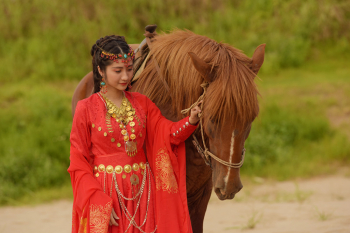 Asian woman, red dresses and horse