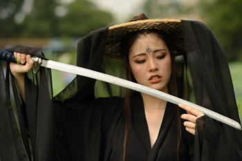 A woman dressed in ancient Chinese martial arts style - NEF format A woman dressed in ancient Chinese martial arts style - NEF format