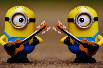 2 Minion Holding Guitar Toy 2 Minion Holding Guitar Toy