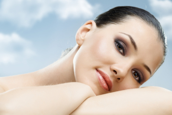 a beauty girl on the sky background a beauty girl on the sky background