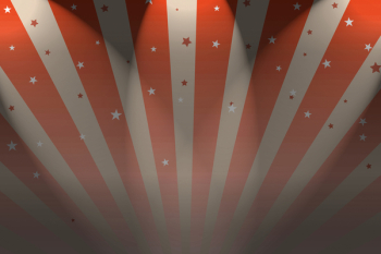 A Circus Big top style background with spotlights.