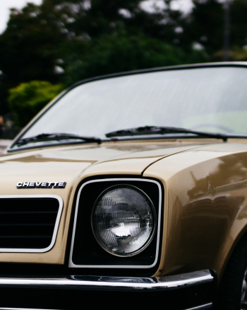 A classic brown car A classic brown car
