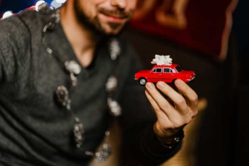 A handsome man with Christmas presents
