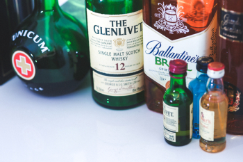 A lot of different bottles of whiskey A lot of different bottles of whiskey
