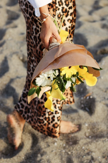 A Person Holding a Flower