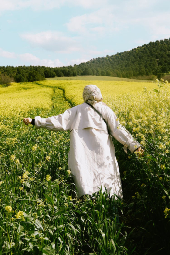 A woman in flower field