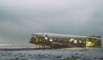 abandoned plane under white sky abandoned plane under white sky