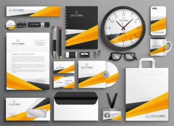 Abstract yellow business stationery set Free Vector