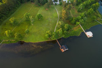 Aerial of house near river Aerial of house near river
