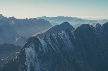 aerial photography of mountains during daytime aerial photography of mountains during daytime