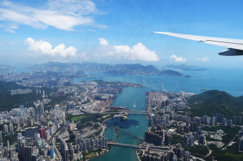 Aerial View of City Through Airplane Window Aerial View of City Through Airplane Window