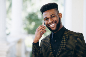 African american business man talking on the phone African american business man talking on the phone