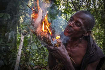 African man blowing on fire, | Free Photo - rawpixel African man blowing on fire, | Free Photo - rawpixel
