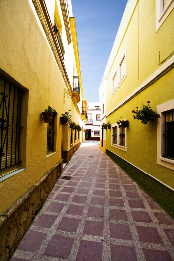 Alley Between Yellow Buildings Alley Between Yellow Buildings