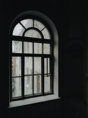 Arched Glass Window With Dark Background Arched Glass Window With Dark Background