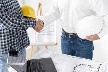 Architect finishing negotiating the project Free Photo Architect finishing negotiating the project Free Photo