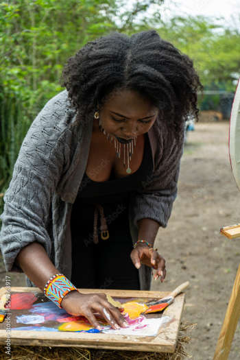 artist mixing paint with her hands artist mixing paint with her hands