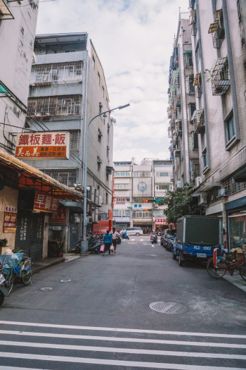 Asphalt Road Between Buildings Asphalt Road Between Buildings