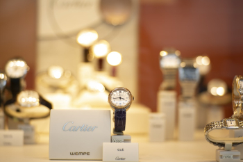 Assorted Cartier Analog Watches on Display Assorted Cartier Analog Watches on Display
