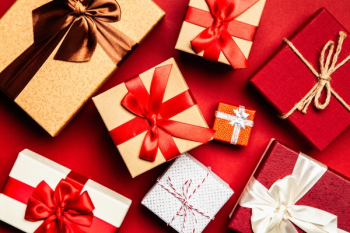 Assorted Gift Boxes on Red Surface Assorted Gift Boxes on Red Surface