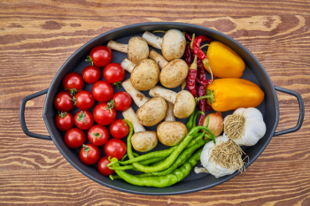 Assorted Spices in Casserole on Brown Wooden Table Assorted Spices in Casserole on Brown Wooden Table