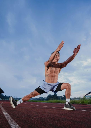 Athletic Male Runner in Dynamic Performance Pose