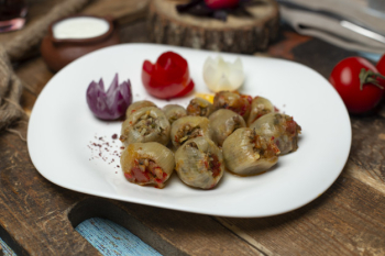 Azerbaijani onion dolma stuffed with meat. Free Photo Azerbaijani onion dolma stuffed with meat. Free Photo