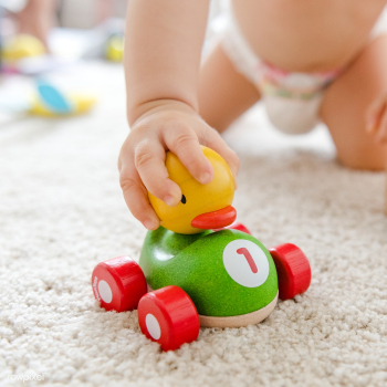 Baby playing with a wooden car | Free stock photo - 546168 Baby playing with a wooden car | Free stock photo - 546168