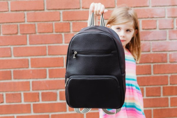 Back To School Holding Out Backpack Back To School Holding Out Backpack