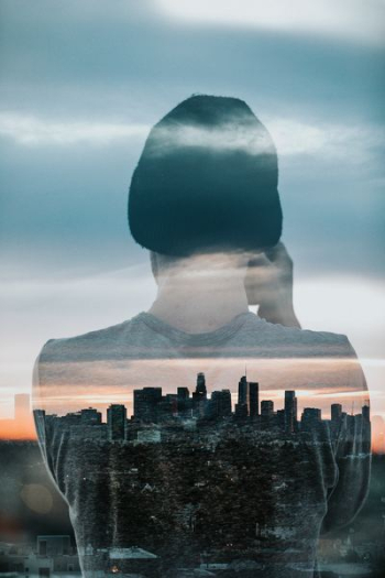 back view of person with cityscape view back view of person with cityscape view