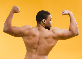 Back view of shirtless athletic man biceps Free Photo Back view of shirtless athletic man biceps Free Photo