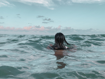 Back View Woman in Body of Water Back View Woman in Body of Water
