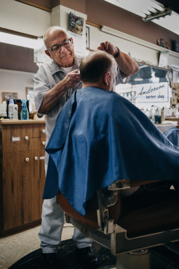 Barber Cutting Man's Hair Barber Cutting Man's Hair