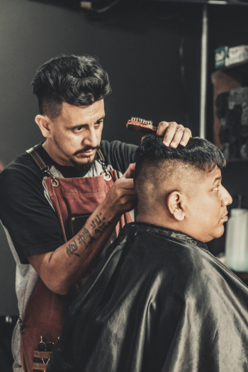 Barber Cutting Man's Hair Barber Cutting Man's Hair