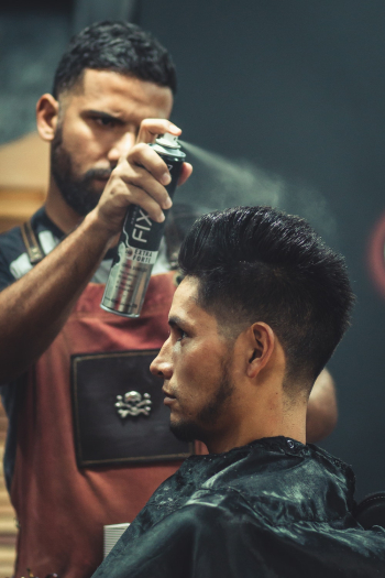 Barber Using Hair Spray Barber Using Hair Spray