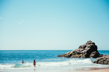 Beach Goers Swim In Ocean Beach Goers Swim In Ocean