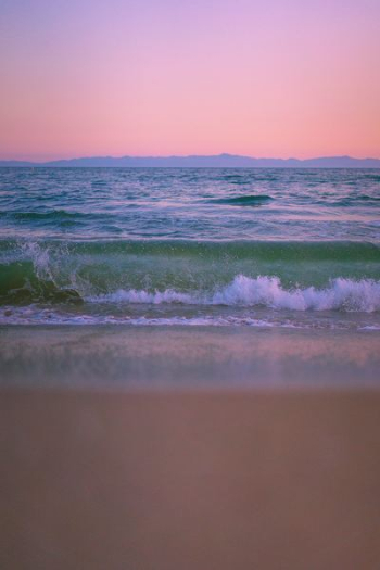 beach wave on white sand beach wave on white sand