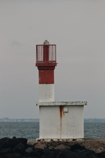 Beacon tower near stormy sea Beacon tower near stormy sea