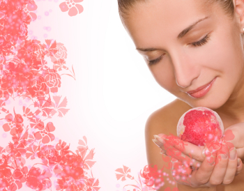 Beautiful girl with an aroma bath ball
