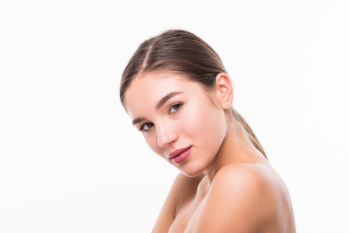 Beautiful sensual woman touching her face isolated on white wall. beauty and skincare concept. spa. Free Photo