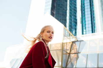 Beautiful serious caucasian woman walking outdoors. Free Photo Beautiful serious caucasian woman walking outdoors. Free Photo