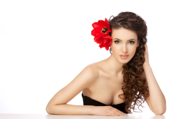 Beautiful woman with red flowers Beautiful woman with red flowers