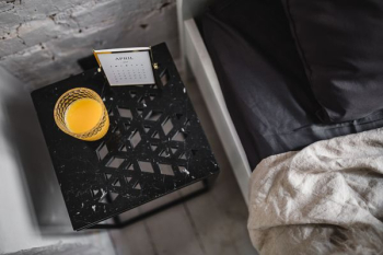 Bedroom interior with marble bedside table Bedroom interior with marble bedside table