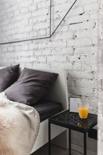 Bedroom interior with marble bedside table Bedroom interior with marble bedside table