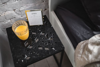 Bedroom interior with marble bedside table Bedroom interior with marble bedside table
