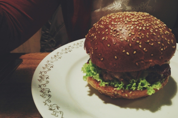Beef burger in a restaurant Beef burger in a restaurant