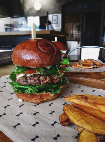 Beef burger with homemade baked potatoes Beef burger with homemade baked potatoes