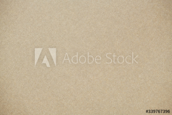 Beige glitter textured paper background Beige glitter textured paper background